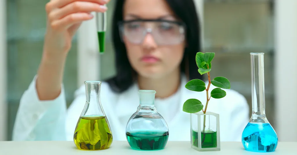 Food technicians analyses natural flavor ingredient samples.