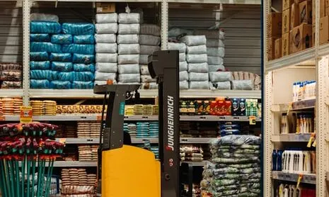A forklift inside a warehouse facility.