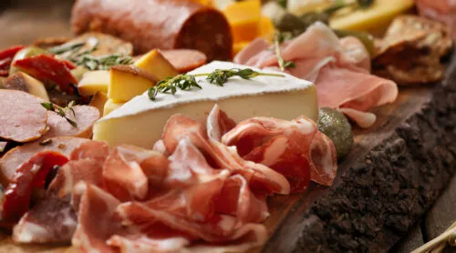 A charcuterie board of meat snacks.